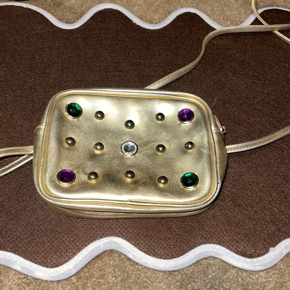 Vintage gold crossbody with jewels.